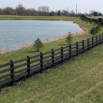 fence around a lake